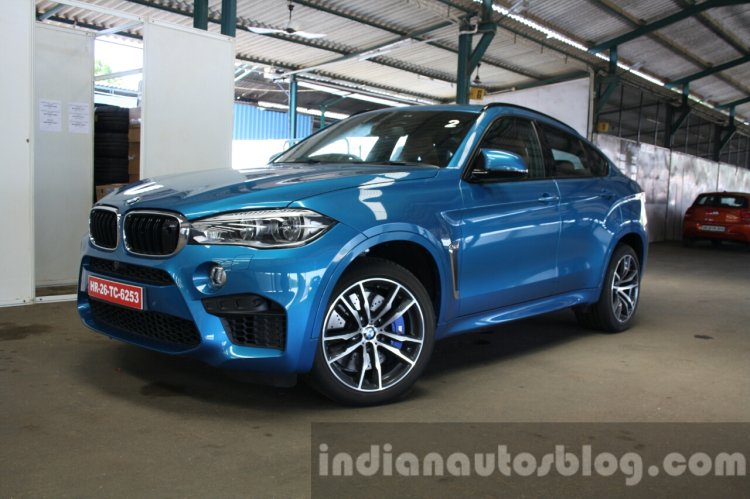 2015 BMW X6 M front three quarter with turn-in first drive review