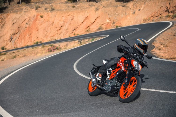2017 KTM Duke 390 front three quarters in motion