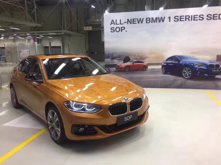BMW 1 Series Sedan front three quarters right side