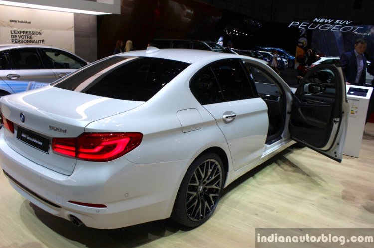India-bound 2017 BMW 5 Series rear three quarter at the 2017 Geneva Motor Show Live