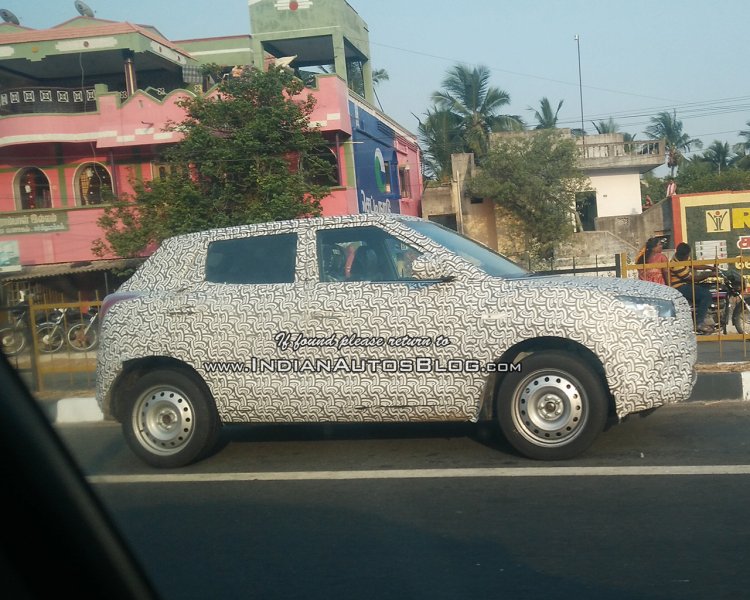 Mahindra S201 base compact SUV front three quarter spied testing