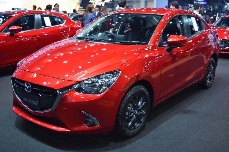 Mazda2 sedan front three quarters left side at 2017 Bangkok International Motor Show
