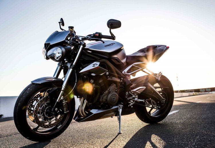 2017 Triumph Street Triple RS press front left quarter