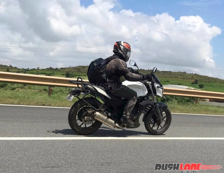 Low Cost Mahindra Mojo spied with accessories rear right quarter