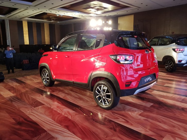 Mahindra KUV100 NXT Red & Black rear three quarters left side