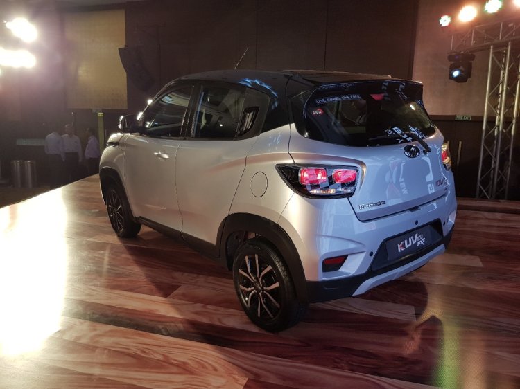 Mahindra KUV100 NXT Silver & Black rear three quarters left side