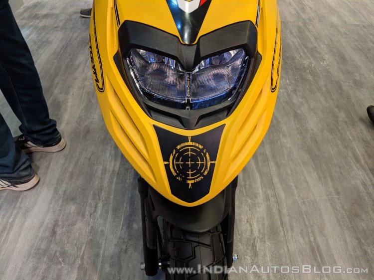 Aprilia Storm Yellow with accessories headlight at 2018 Auto Expo