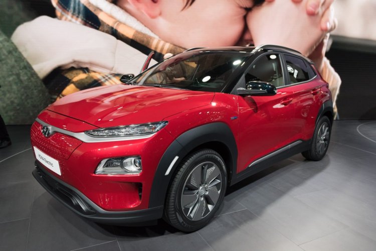 Hyundai Kona Electric red front three quarters at 2018 Geneva Motor Show