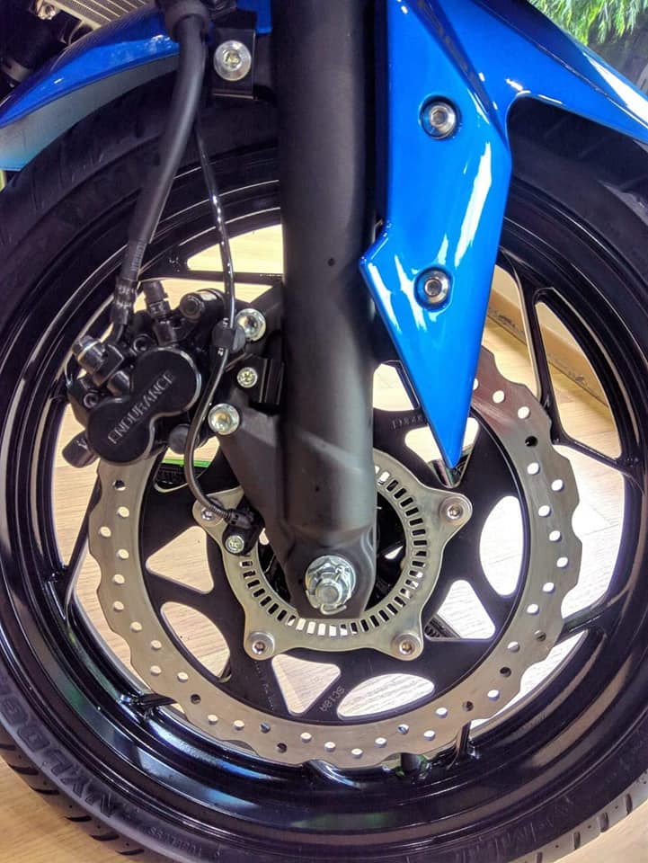 Kawasaki Ninja 300 2018 blue left quarter disc brakes ABS unit