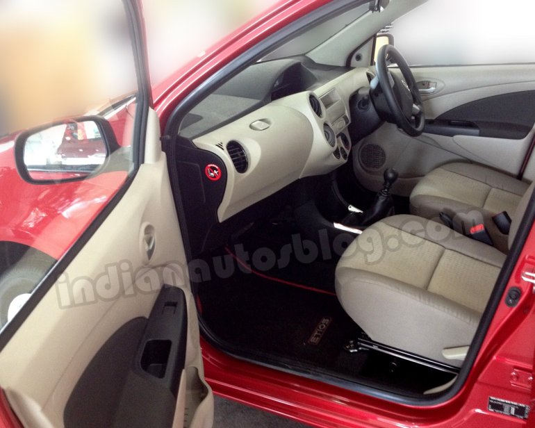 Toyota Etios Liva with beige interior from passenger side
