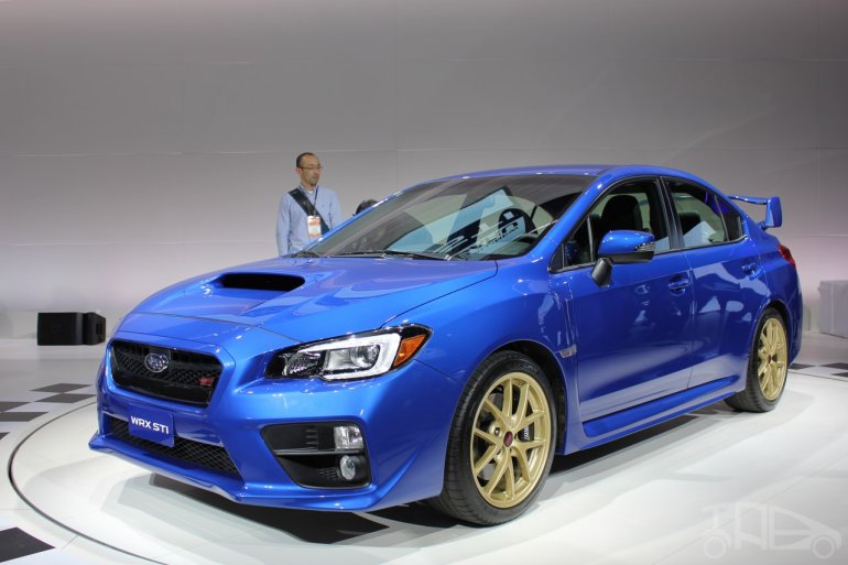 2015 Subaru WRX STi front three quarters right at NAIAS 2014
