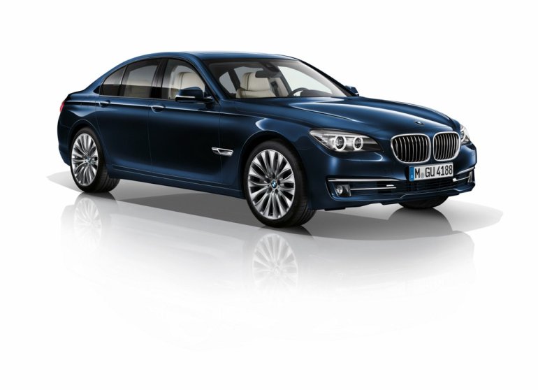 BMW 730d Edition Exclusive Imperial Blue front three quarter press shot