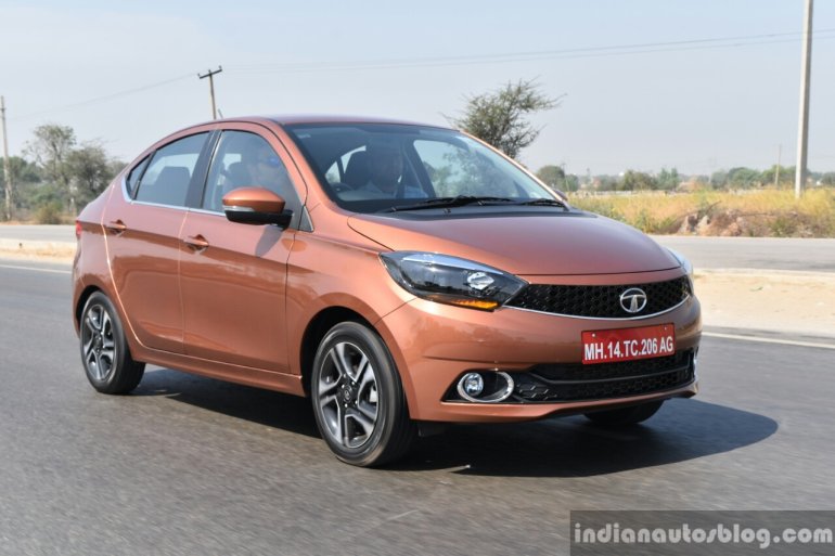 Tata Tigor petrol front three quarter highway First Drive Review