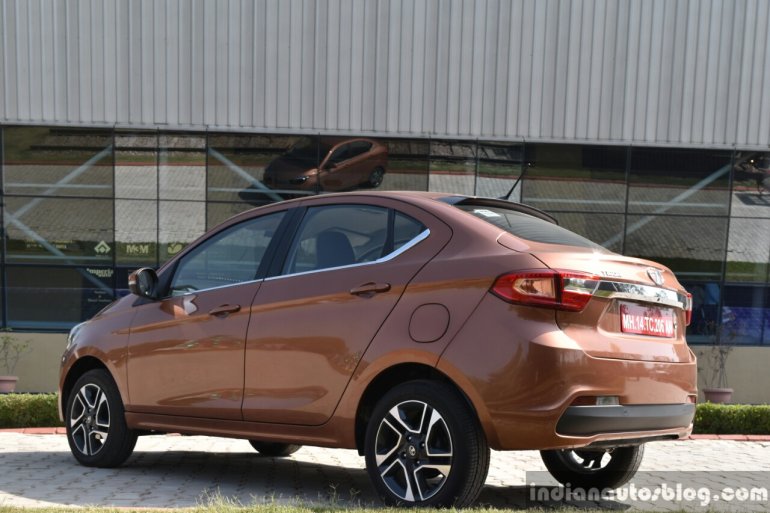 Tata Tigor petrol rear three quarter low First Drive Review