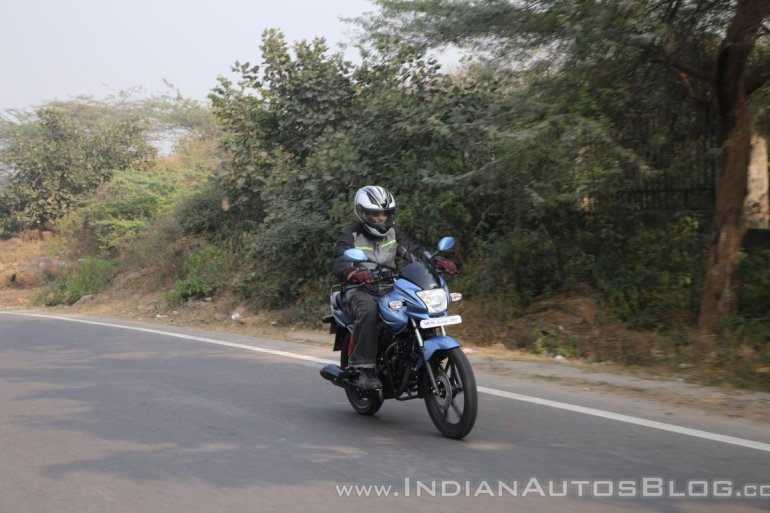 2018 Hero Passion Pro First Ride Review front right quarter tracking shot