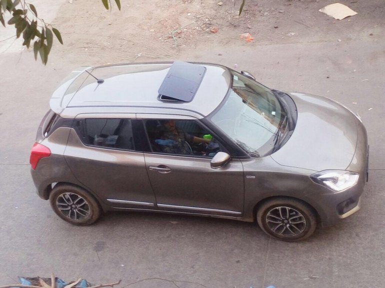 Check out this 2018 Maruti Swift with aftermarket sunroof!